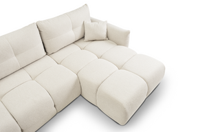Divano letto angolare in tessuto bouclè Dublino 257x111/177 cm