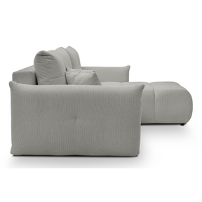 Divano letto angolare in tessuto bouclè Dublino 257x111/177 cm