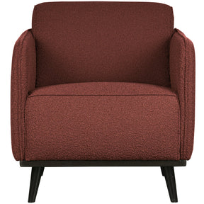 Poltrona in tessuto bouclé con braccioli Statement 72x77 cm