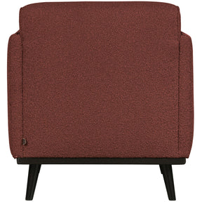 Poltrona in tessuto bouclé con braccioli Statement 72x77 cm