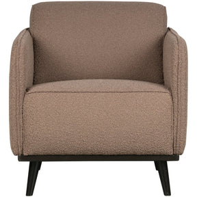 Poltrona in tessuto bouclé con braccioli Statement 72x77 cm