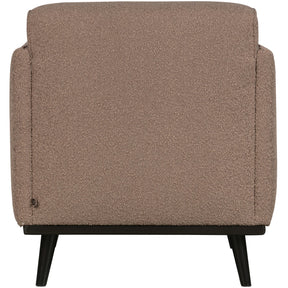 Poltrona in tessuto bouclé con braccioli Statement 72x77 cm