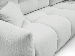 Divano letto angolare in tessuto bouclè Dublino 257x111/177 cm