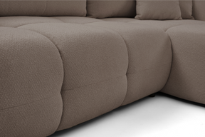 Divano letto angolare in tessuto bouclè Dublino 257x111/177 cm