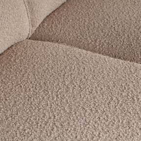 Divano in tessuto bouclé Statement