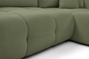 Divano letto angolare in tessuto bouclè Dublino 257x111/177 cm